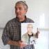Walter Robinson holding "Watercolor Portrait a Day" #184 by Brenda Zlamany. Photo: Brenda Zlamany