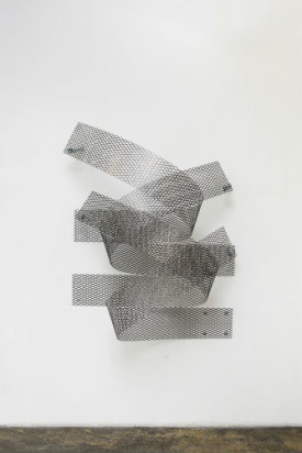 Ryan Roa, Expanded Steel Relief #5, 2015. Expanded steel, nuts bolts, washers and lag bolts, 77 x 64 x 33 inches. Courtesy gallery nine 5. Photo: Laura DeSantis-Olsson