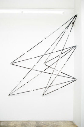 Ryan Roa, Space Drawing #40, 2015. Black rubber bungee cords and hardware, 120 x 85 x 14 inches. Courtesy gallery nine 5. Photo: Laura DeSantis-Olsson