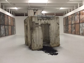 Anselm Kiefer, Geheimnis der Farne, 2007. Installation of 48 pictures and two concrete sculptures, clay argile, ferns, emulsion and concrete. Two 55-foot long parallel walls of connected images. At Margulies Collection at the Warehouse, Miami, FL.