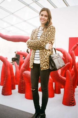 Dasha Zhukova in front of Yayoi Kusama sculpture