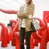 Dasha Zhukova in front of Yayoi Kusama sculpture