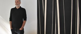 Photograph of David Rhodes with his work at Hionas Gallery by Mary Jones, 2016