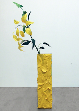 Jane Benson, Faux Faux (Iris Yellow), 2015. Hand cut artificial flower and glass 30 x 15 x 13 inches. Courtesy of the artist and The Parlour Bushwick