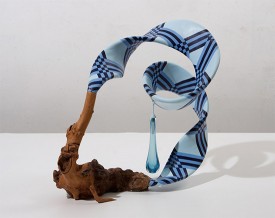 John Newman, Blue Ribbon Teardrop, 2008. Wood burl, blown glass, acrylic paint on acqua resin, wood putty, Japanese paper, papier mache, Foamcore, armature wire, string, 14-1/2 x 15-1/2 x 9 inches. The Louis-Dreyfus Family Collection