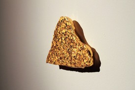 Shinji Turner-Yamamoto, Pentimenti #1, 2010. Found plaster and chipped paint fragments, 24kt gold leaf, gesso, clay bole, animal glue, tree resin, 5-1/2 × 8 × inches. Courtesy of Sapar Contemporary