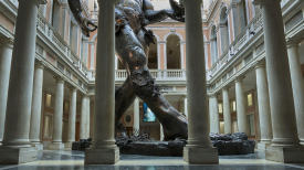 Damien Hirst, Demon with Bowl (Exhibition enlargement), as seen in his exhibition, Treasures from the Wreck of the Unbelievable, Palazzo Grassi, Venice, 2017. Photographed by Prudence Cuming Associates. © Damien Hirst and Science Ltd. All rights reserved, DACS/SIAE 2017