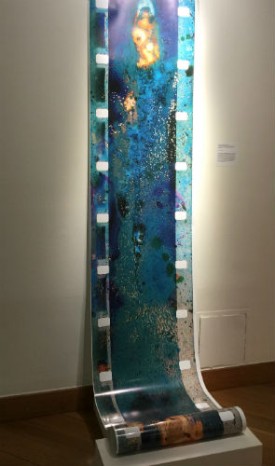 Barbara Hammer, Blue Paint Film Scroll, 2015. Crystals in hydrochloric acid and paint on film, digitally transferred and printed on archival photo paper. Courtesy of the artist.