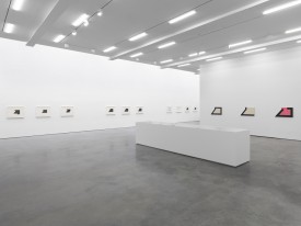 Installation shot of the exhibition under review. Center of right wall shows Tedd Stamm, 78-W-4 (Wooster), 1978. Oil on canvas, 60 x 96 inches. Ted Stamm © 2018 Courtesy Lisson Gallery