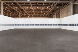 Marcia Hafif, An Extended Gray Scale at, 1973. Oil on canvas, 106 parts, each 22 × 22 inches. Installed in 2015 at Unlimited. Courtesy of Fergus McCaffrey ©Marcia Hafif