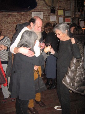 Marcia Hafif, right, raises a glass with Lilly Wei and Lawrence Wiener