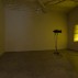 Hiraki Sawa (left), Dwelling, 2002. Video, 9:20 minutes; Olafur Eliasson (right), Yellow Double Hung Windows, 1999. Two halogen, 60 watt profle spotlights on tripod with gobos, dimensions variable. Courtesy of the artists and 601Artspace. Photo: Jason Mandella