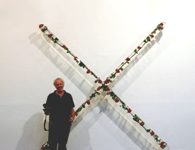 Donald Lipski with Water Lilies No. 32, 1989-90, at The Corcoran Gallery of Art, Washington D.C. in 2006. Roses in a preservative solution, glass acid wasteline tubing, stainless steel, rubber and Teflon fittings, 108 x 108 x 4 inches. Photo courtesy of the artist.
