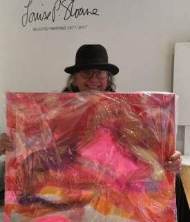 Richard Timperio during installation of an exhibition of Louise P. Sloane. Photo: Debra Drexler