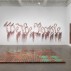 Installation shot of the exhibition under review, with works by Nari Ward: “We the People,” 2011; “Ground (In Progress),” 2015; “Breathing Panel: Oriented Center,” 2015.. Image courtesy of the New Museum. Maris Hutchinson/EPW Studio