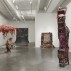 Installation shot of the exhibition under review, with works by Nari Ward: “Sky Juice,” 1993; “Iron Heavens,” 1995; “Blue Window-Brick Vine,” 1993; “Savior,” 1996. Image courtesy of the New Museum. Maris Hutchinson/EPW Studio
