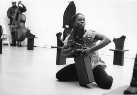 Tom Buckner, William Parker & Maria Mitchell performing with works by Alain Kirili in the Kirili's exhibition at Marlborough Gallery, New York, 1998. Photo: Ariane Lopez-Huici
