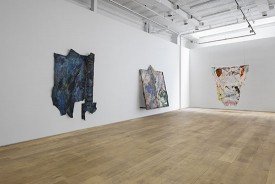 Installation shot of Suzanne Jackson’s exhibition with, left to right, Blues Garden + Track/Back-Sea, 2010; oldblueshanging, while she waits, 2017; and Light, light into Being, 2019. Courtesy of Ortuzar Projects